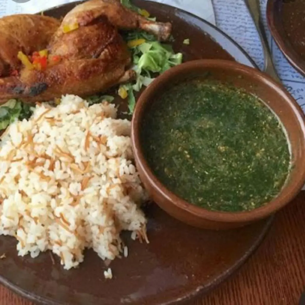 Molokhiya Meal With Half A Fried Chicken And Vermicelli Rice
